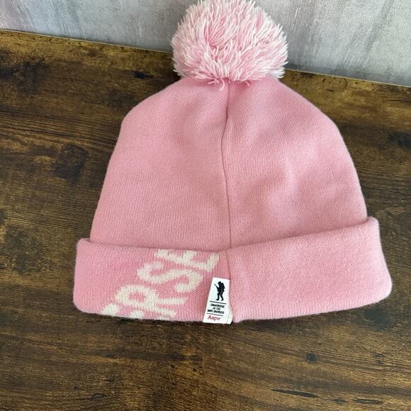 AAPE by A Bathing Ape Pink Pom Beanie “Somewhere in the Aape Universe” Knit Hat main image 16